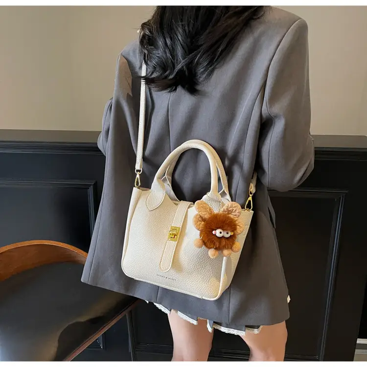 Women's White Leather Bucket Bag with Cute Pom Pom Charm — feature 12