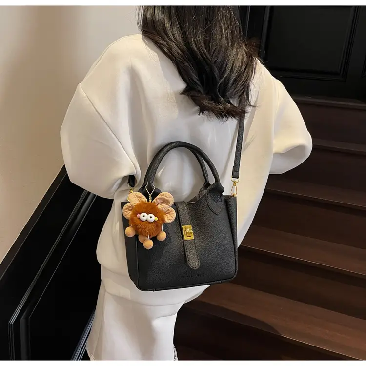 Women's White Leather Bucket Bag with Cute Pom Pom Charm — feature 17