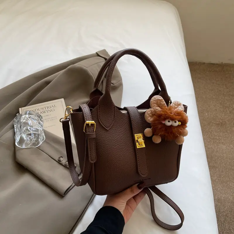 Women's White Leather Bucket Bag with Cute Pom Pom Charm - Image 2