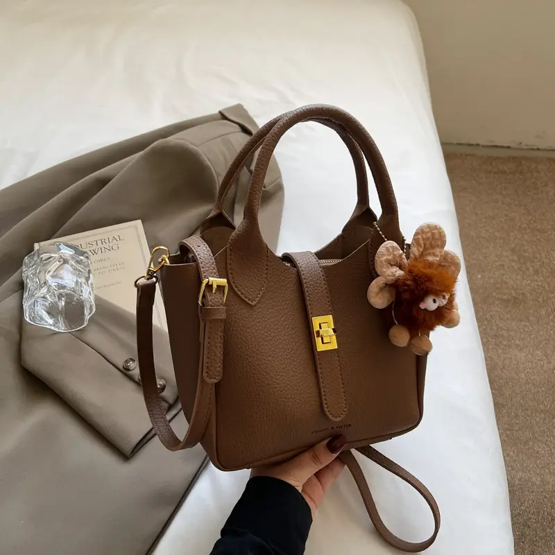 Women's White Leather Bucket Bag with Cute Pom Pom Charm - Image 4
