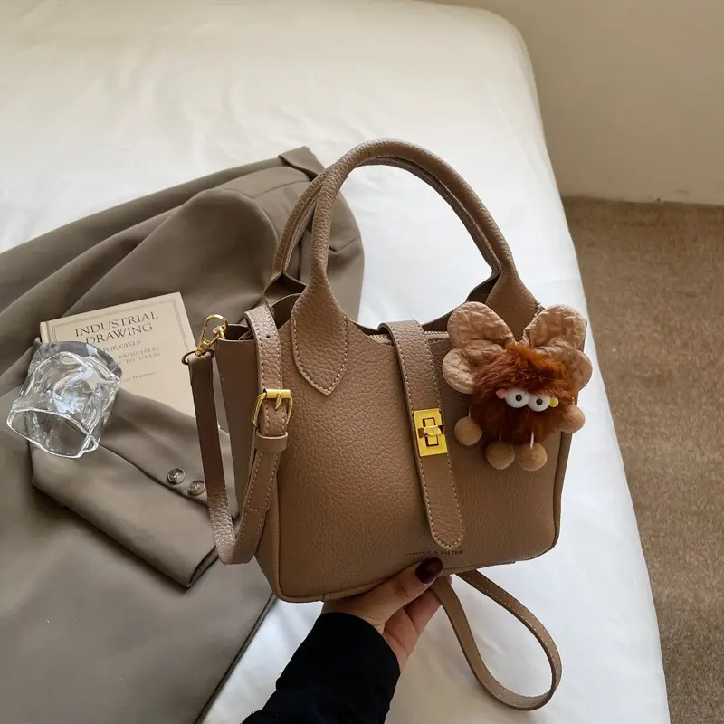Women's White Leather Bucket Bag with Cute Pom Pom Charm - Image 5