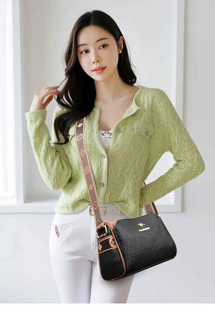 Women's Black Textured Shoulder Bag with Brown Trim — feature 10
