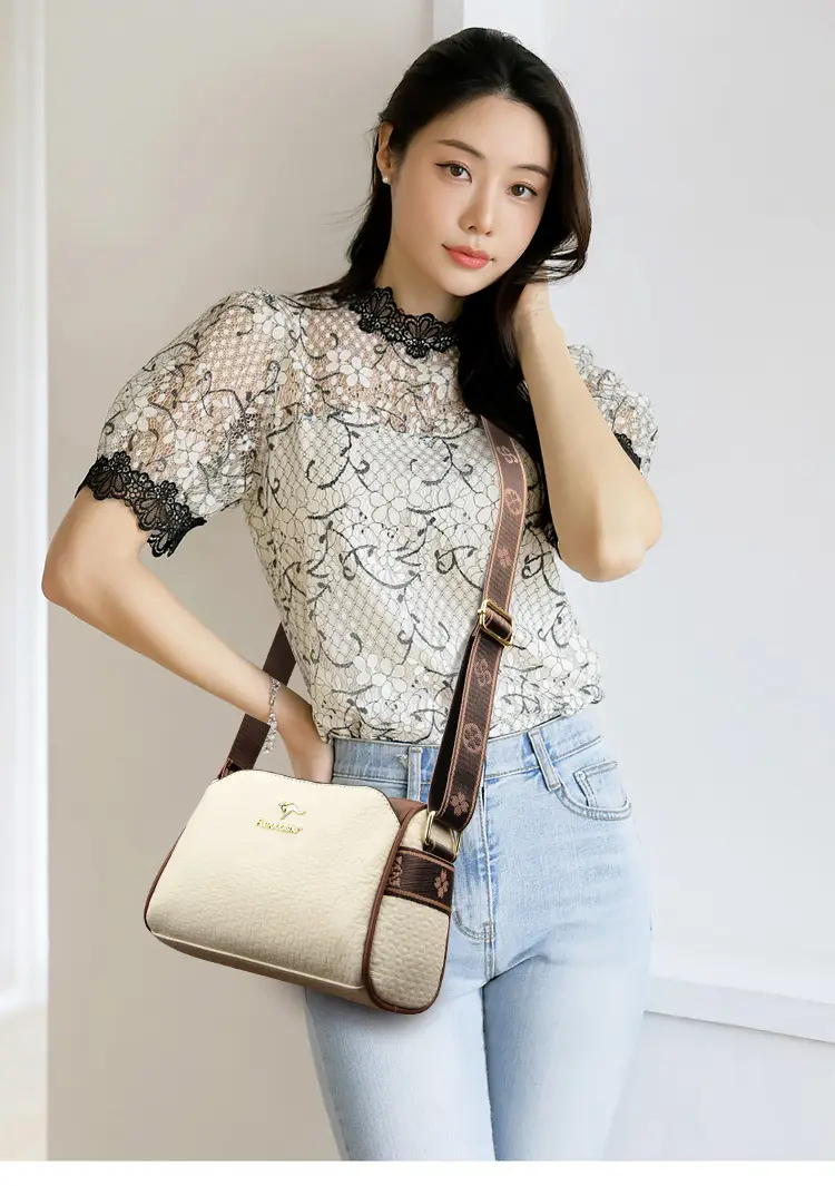 Women's Black Textured Shoulder Bag with Brown Trim — feature 11