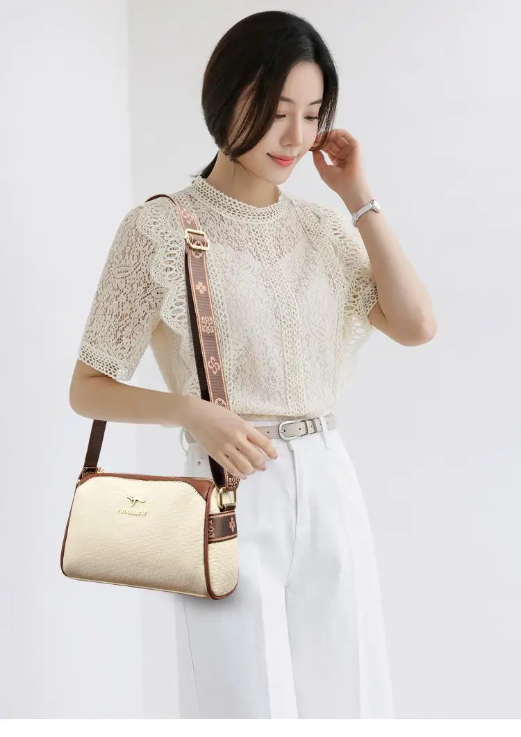 Women's Black Textured Shoulder Bag with Brown Trim — feature 13