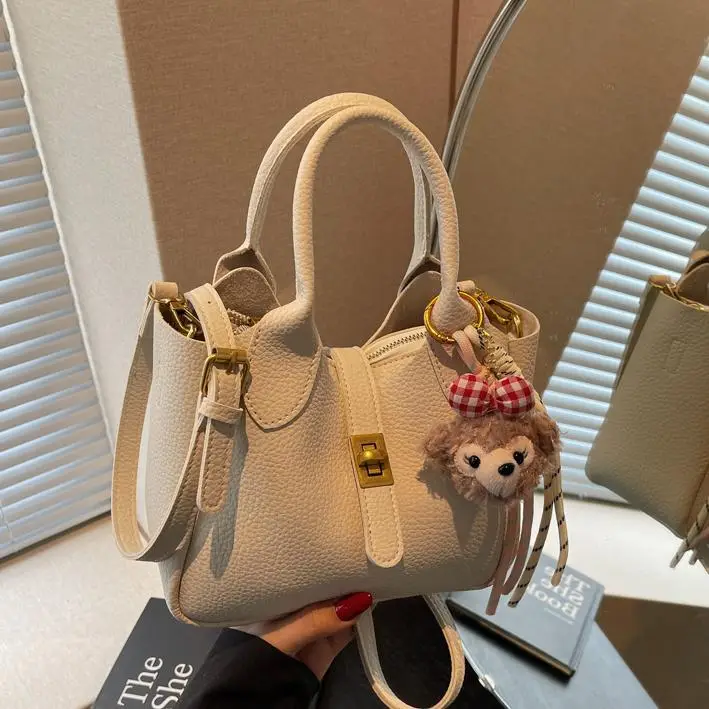 Women's Tan Leather Shoulder Bag with Tassel & Handle - Image 8