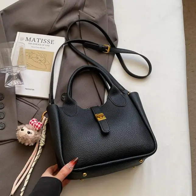 Women's Tan Leather Shoulder Bag with Tassel & Handle - Image 10