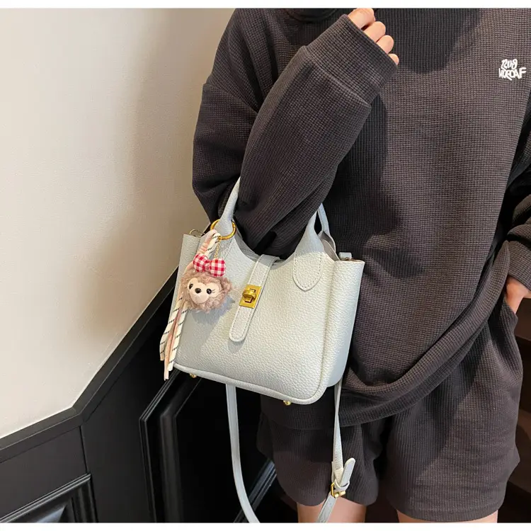 Women's Tan Leather Shoulder Bag with Tassel & Handle — feature 28
