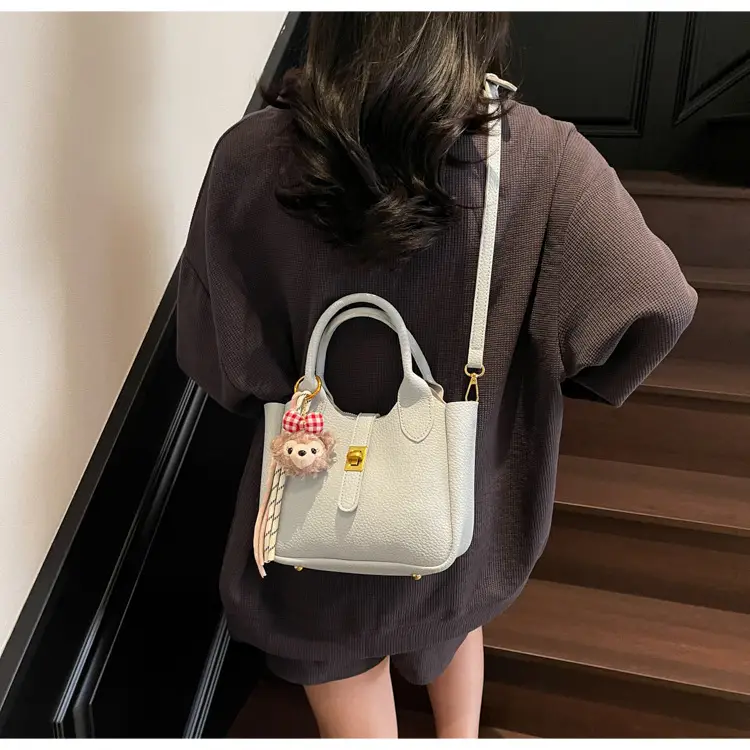 Women's Tan Leather Shoulder Bag with Tassel & Handle — feature 29