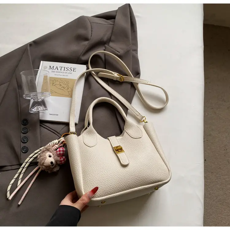 Women's Tan Leather Shoulder Bag with Tassel & Handle — feature 36