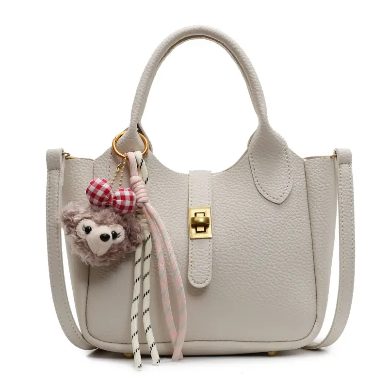 Women's Tan Leather Shoulder Bag with Tassel & Handle - Image 2