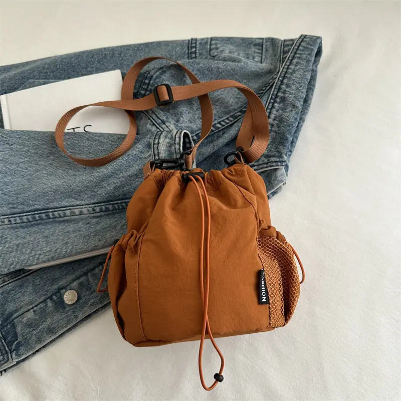 White Drawstring Bucket Bag for Commuters & Casual Use - Image 3