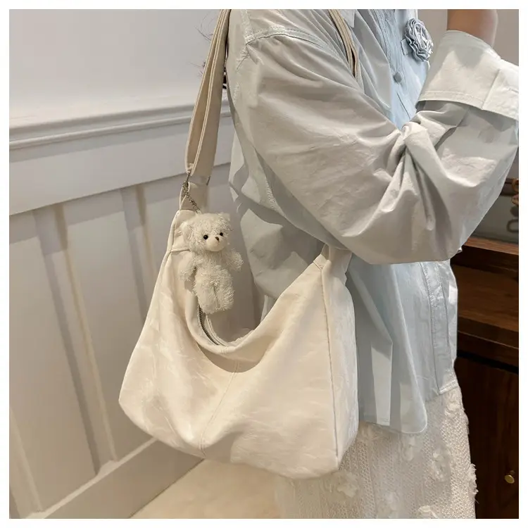 2024 Soft Puffer Shoulder Bag with Teddy Bear Pendant — feature 1
