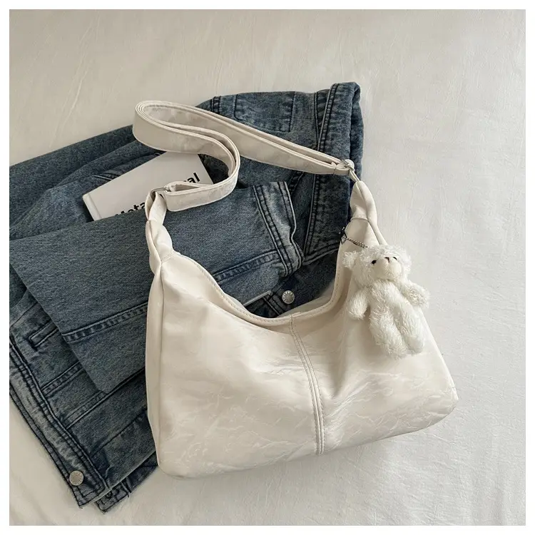 2024 Soft Puffer Shoulder Bag with Teddy Bear Pendant — feature 11