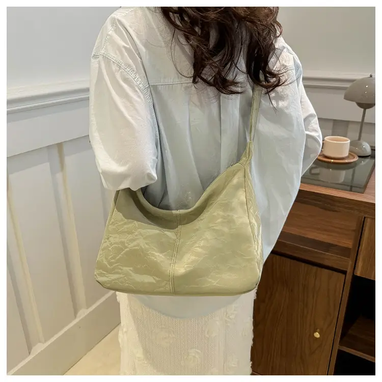 2024 Soft Puffer Shoulder Bag with Teddy Bear Pendant — feature 17