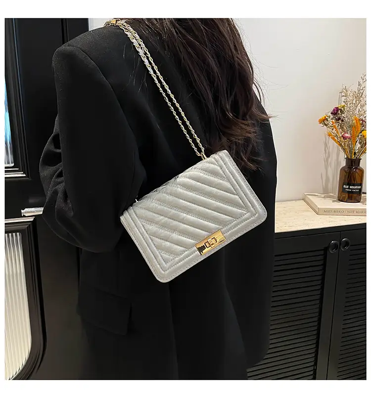 2025 Spring White Quilted Crossbody Bag with Gold Chain — feature 12