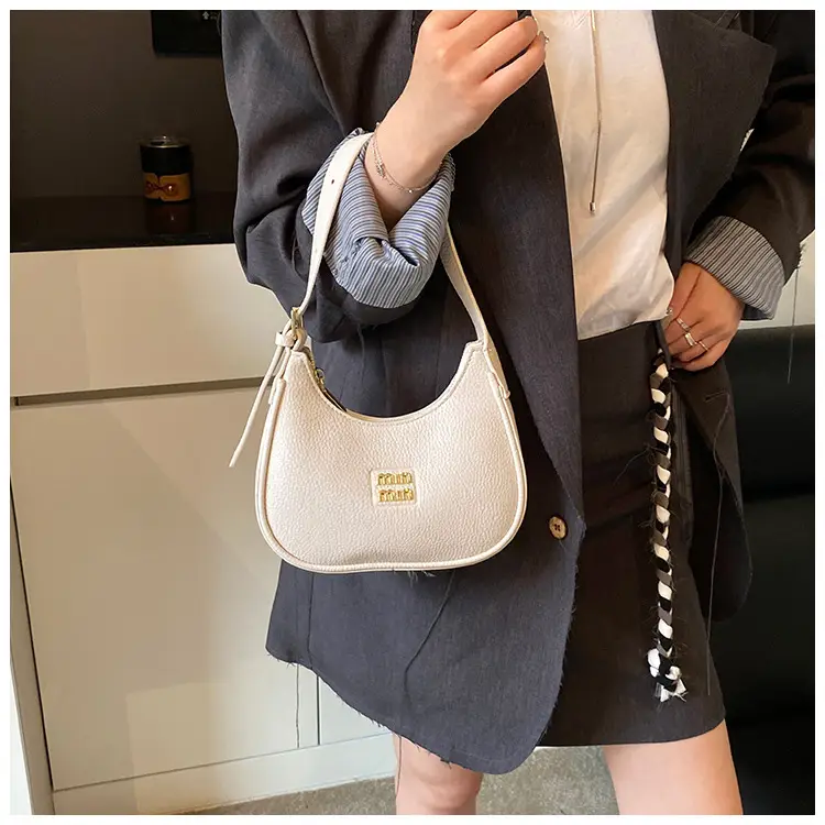 Women's Niche Crossbody Bag Beige 2026 — feature 25