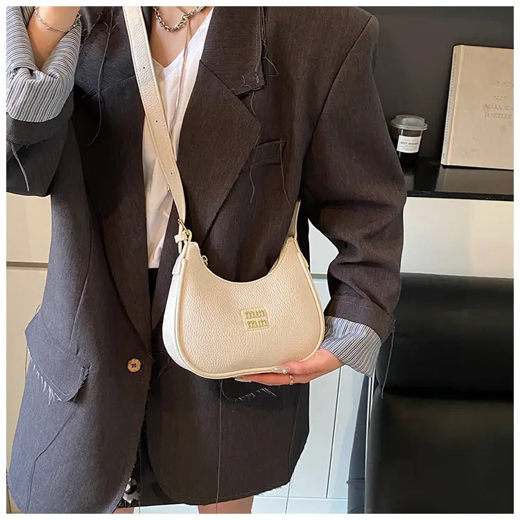 Women's Niche Crossbody Bag Beige 2026 — feature 26