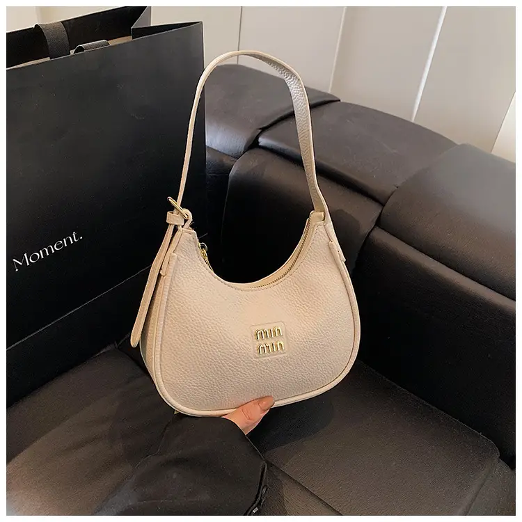 Women's Niche Crossbody Bag Beige 2026 — feature 34