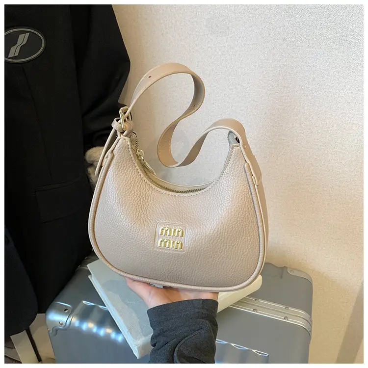 Women's Niche Crossbody Bag Beige 2026 — feature 40