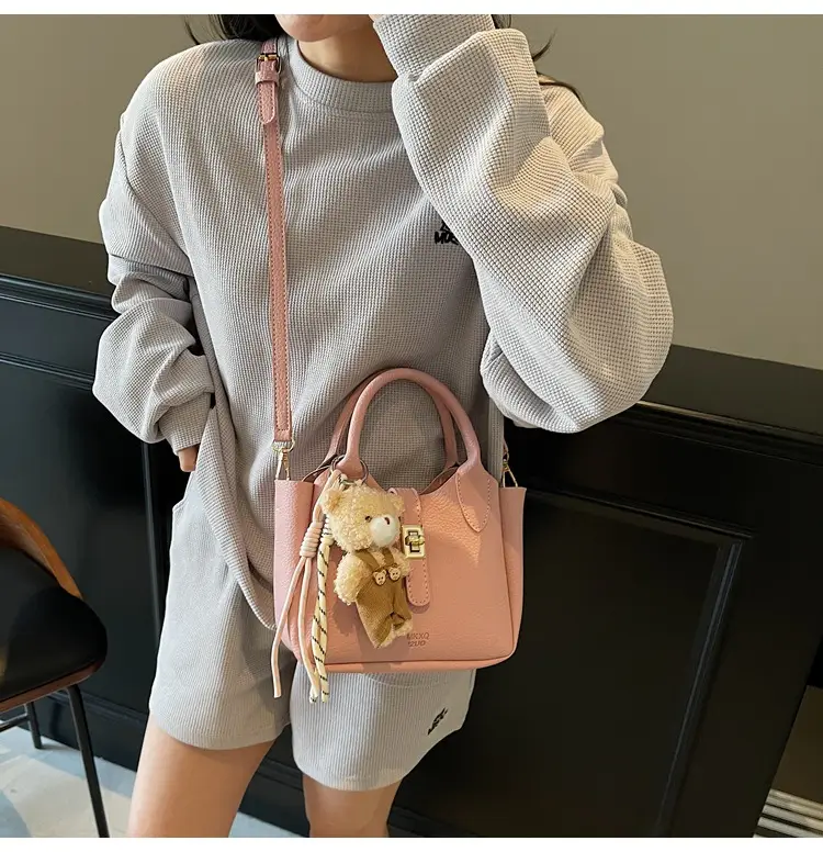 Pink Crossbody Bag with Cute Toy Charm — feature 10