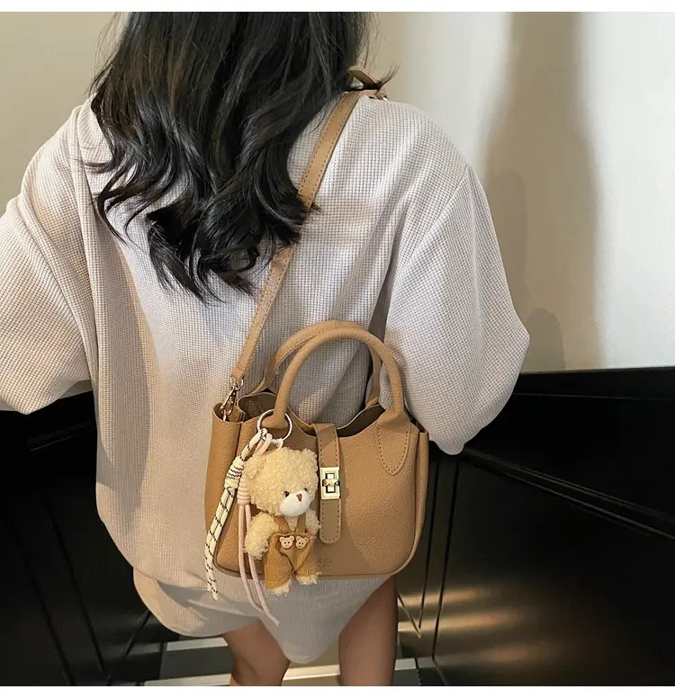 Pink Crossbody Bag with Cute Toy Charm — feature 11