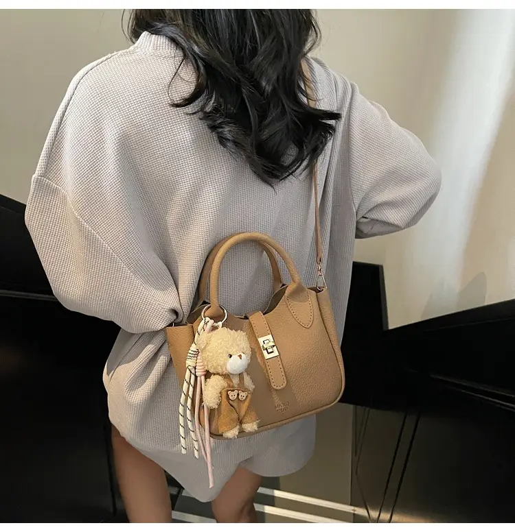 Pink Crossbody Bag with Cute Toy Charm — feature 13