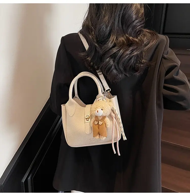 Pink Crossbody Bag with Cute Toy Charm — feature 17
