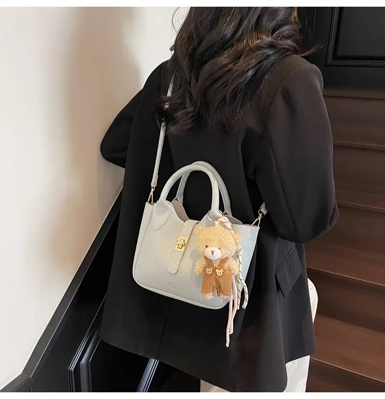 Pink Crossbody Bag with Cute Toy Charm — feature 22