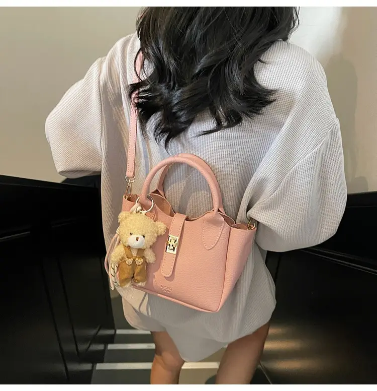 Pink Crossbody Bag with Cute Toy Charm — feature 9