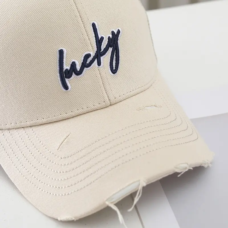 Women Mesh Cap with Embroidered "Bucky" Design — feature 3