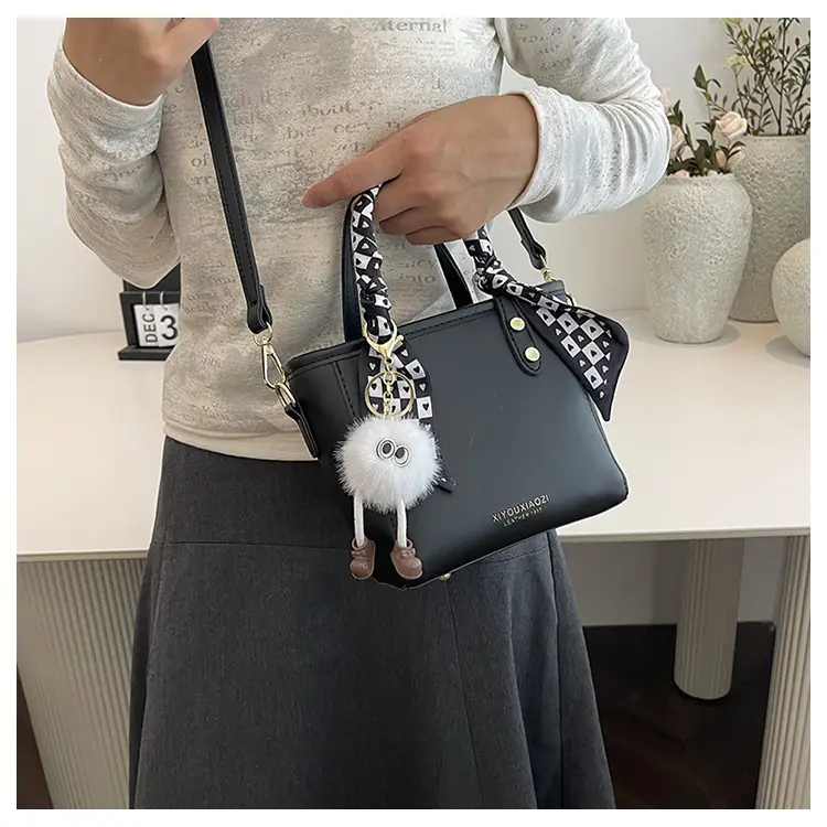 Women Black Contrasting Pom Pom Shoulder Bag — feature 12