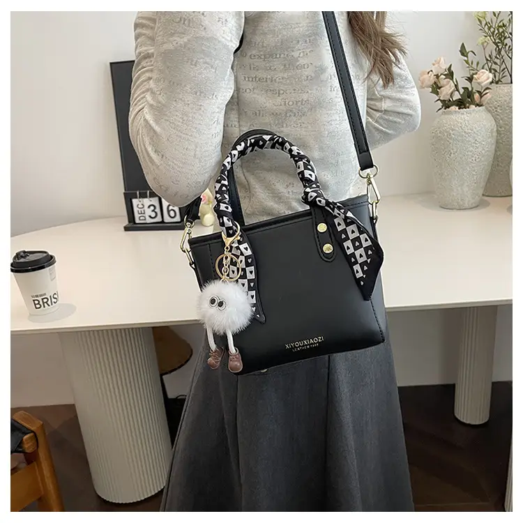 Women Black Contrasting Pom Pom Shoulder Bag — feature 13