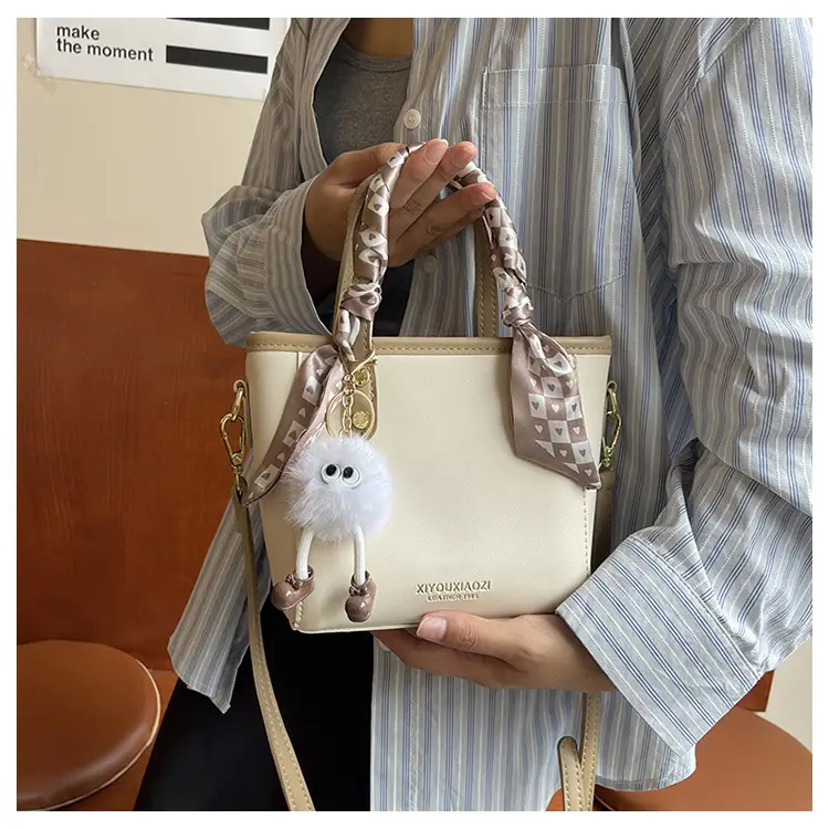 Women Black Contrasting Pom Pom Shoulder Bag — feature 16