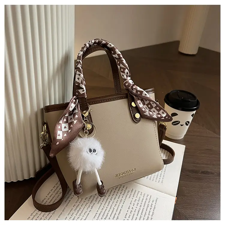 Women Black Contrasting Pom Pom Shoulder Bag — feature 20