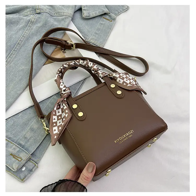 Women Black Contrasting Pom Pom Shoulder Bag — feature 23