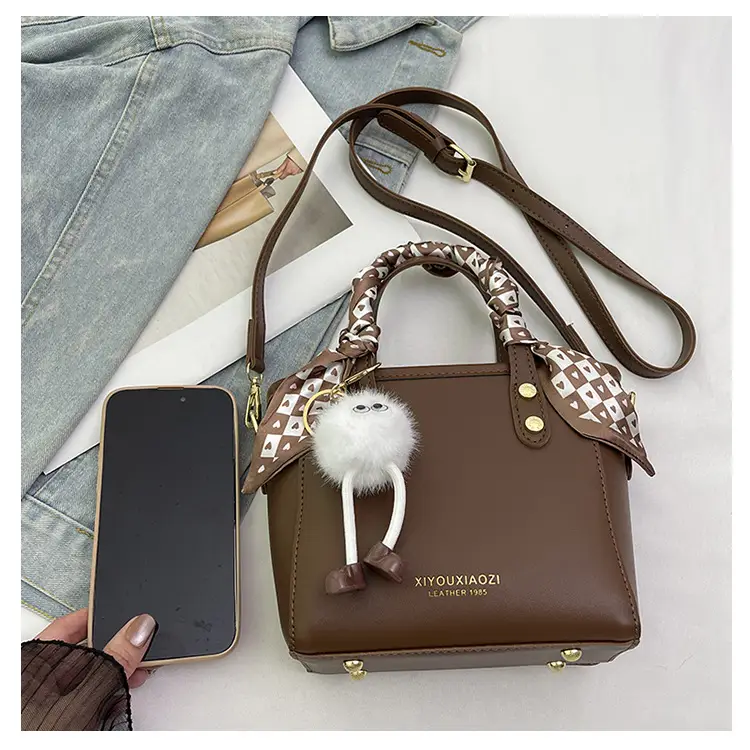 Women Black Contrasting Pom Pom Shoulder Bag — feature 24