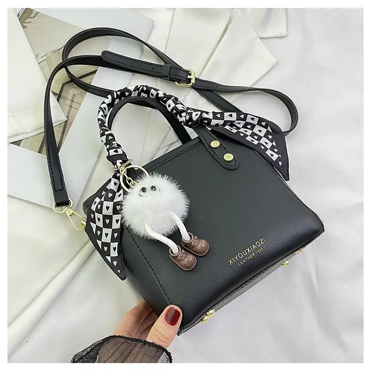 Women Black Contrasting Pom Pom Shoulder Bag — feature 30