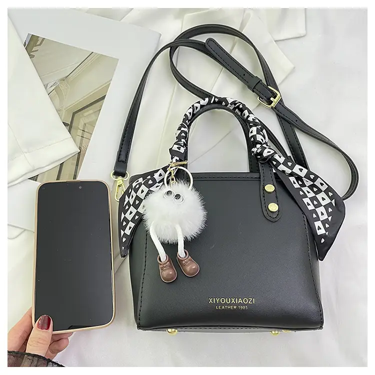 Women Black Contrasting Pom Pom Shoulder Bag — feature 31