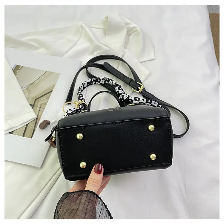 Women Black Contrasting Pom Pom Shoulder Bag — feature 32