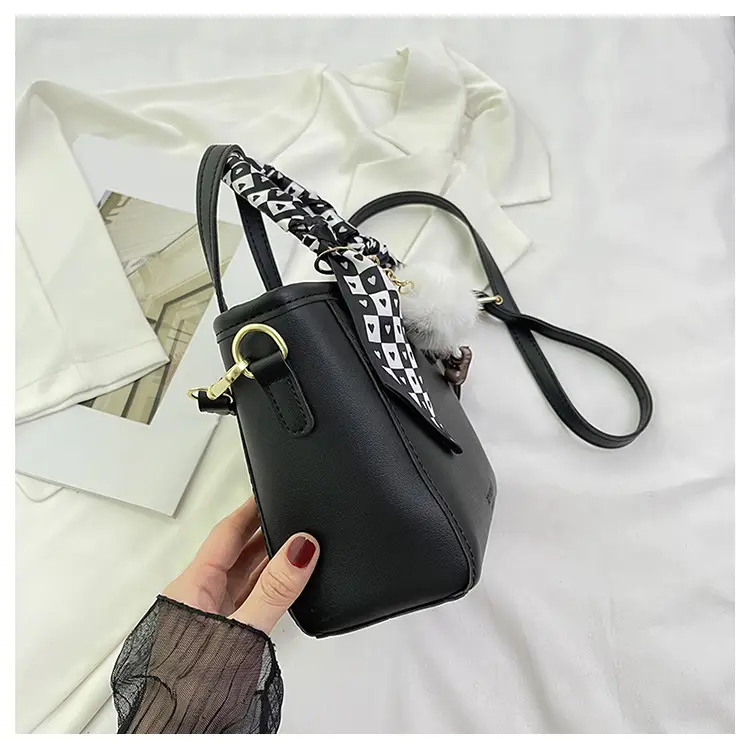 Women Black Contrasting Pom Pom Shoulder Bag — feature 33