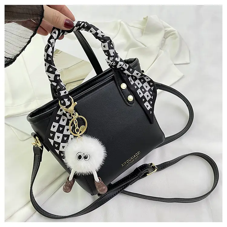 Women Black Contrasting Pom Pom Shoulder Bag — feature 34