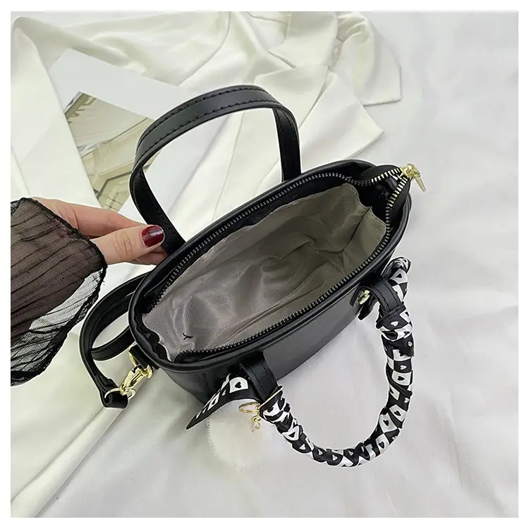 Women Black Contrasting Pom Pom Shoulder Bag — feature 36