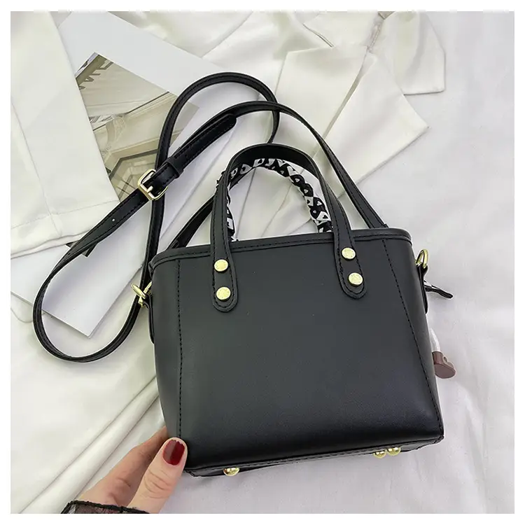 Women Black Contrasting Pom Pom Shoulder Bag — feature 37