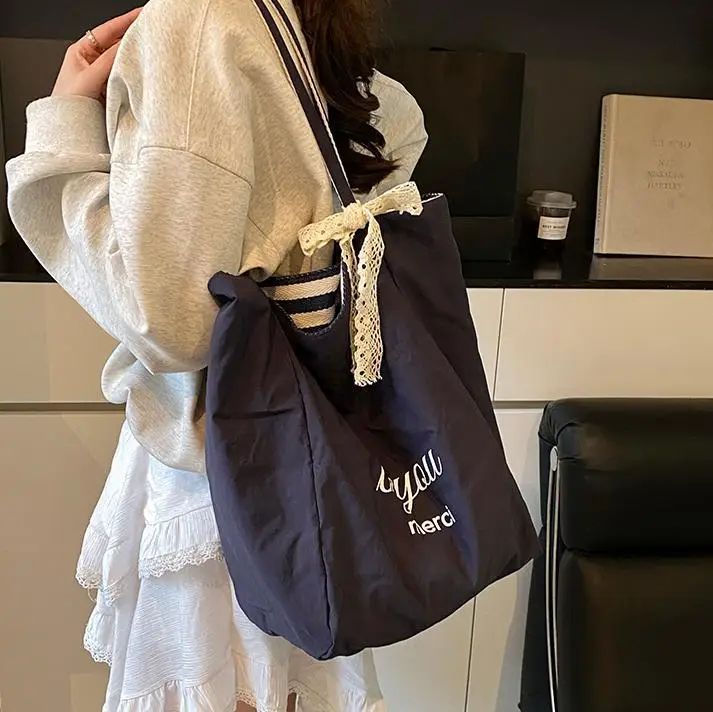 Women's Striped Crossbody Bag with Gold Embroidery - Image 10