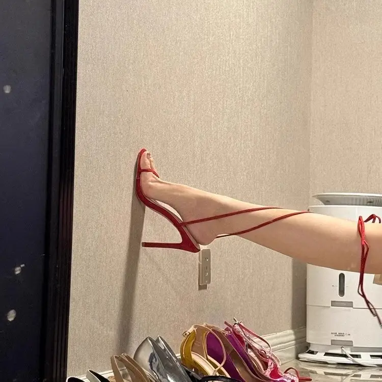 Summer New Style Stiletto Red Strappy Cross Sandals for Women with Open Toes and Hollow Back Straps on the Bed Sexy High Heels