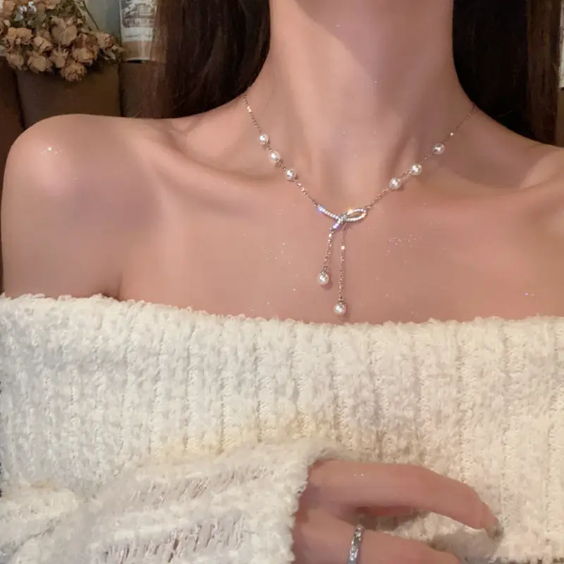 Luxury Pearl Clavicle Chain with Shaking Sound & Burst Effect — feature 29