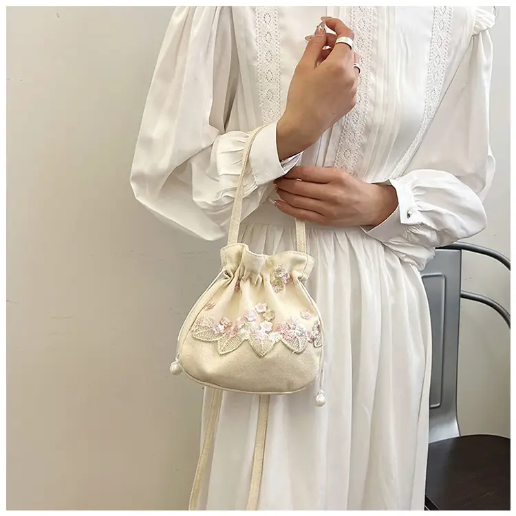 Chinese Embroidered Handbag with Lace Detail — feature 9