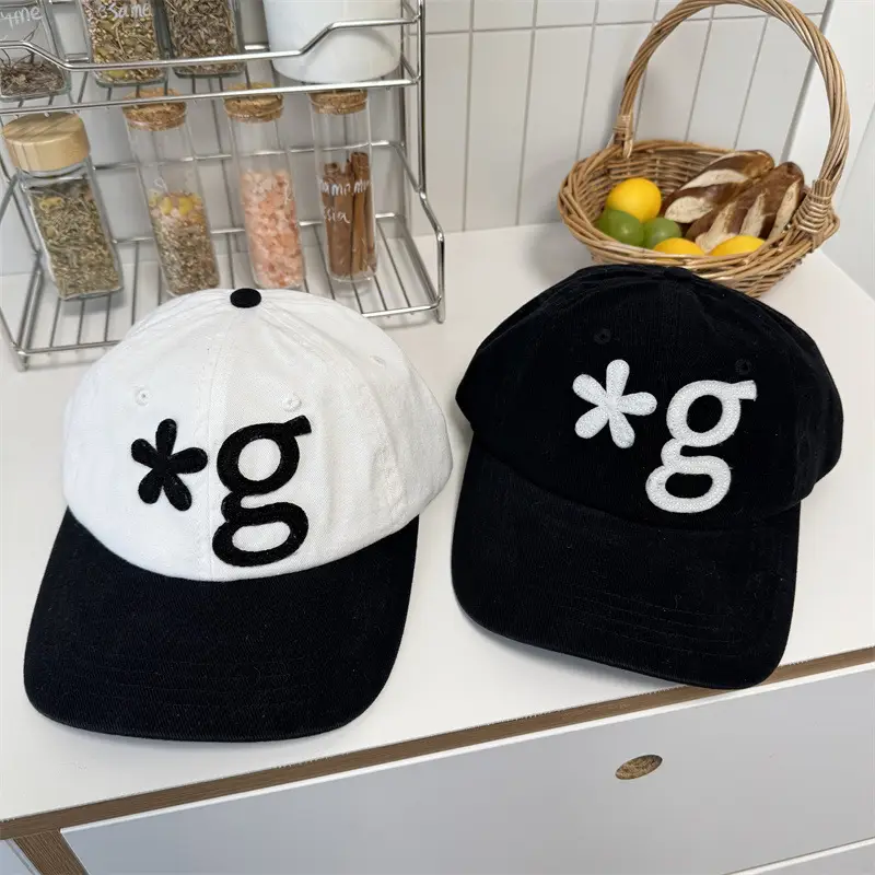 Black Embroidered Peak Cap with White Logo - Image 4