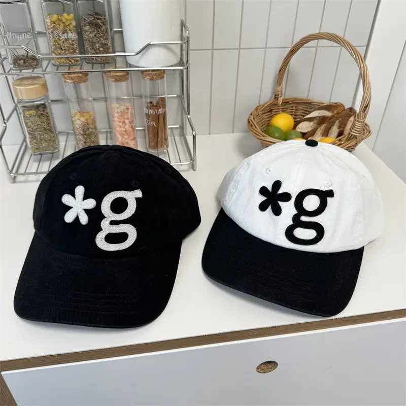 Black Embroidered Peak Cap with White Logo - Image 6