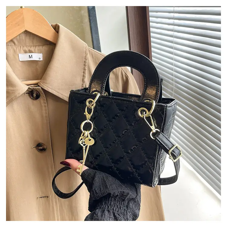 White Quilted Handbag with Gold Chain & Bow — feature 21